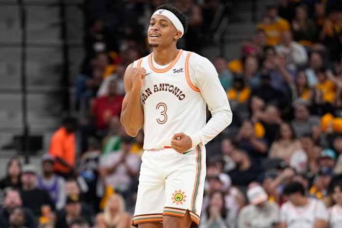 Nov 17, 2023; San Antonio, Texas, USA; San Antonio Spurs forward Keldon Johnson (3) reacts during the first half against the Sacramento Kings at Frost Bank Center.